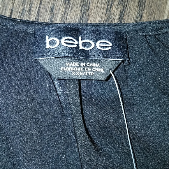 Bebe Ruffle Front Top - Picture 5 of 6